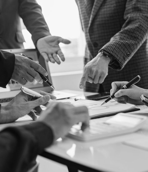 business meeting Sales team meeting of a startup company Brainstorming and summarizing business strategy management ideas Collaborative discussions on financial data analysis and graphs